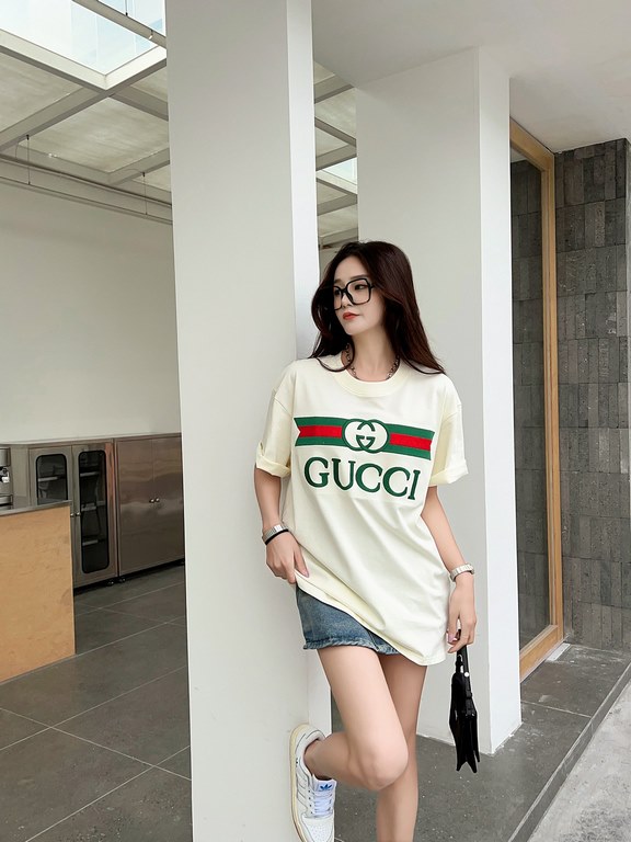 Gucci Gucci Logo Oversized Stylized Embroidered Short Sleeve T-Shirt with Interlocking Buttons-Model's Image