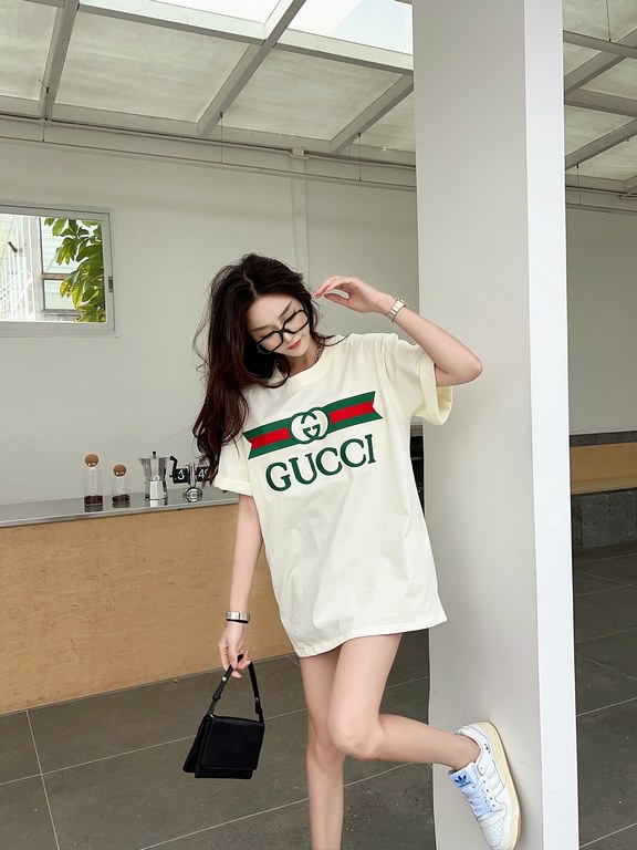 Gucci Gucci Logo Oversized Stylized Embroidered Short Sleeve T-Shirt with Interlocking Buttons-Model's Image