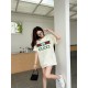 Gucci Gucci Logo Oversized Stylized Embroidered Short Sleeve T-Shirt with Interlocking Buttons-Model's Image