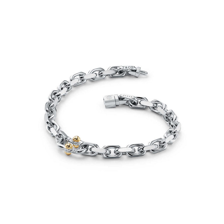 Crafted in sterling silver and white and yellow gold, this link bracelet showcases the pragmatism of classic American design, and the Tiffany 1837 Collection Makers, with its maker's mark, is inspired by the renowned Tif