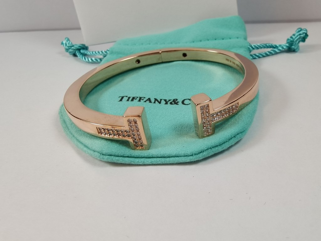 Premium Finishes   Wide Double Row Small Diamonds Double T Bracelet #TiffanyT# Collection, Size Approx. 18cm The vibrant energy of New York City is layered with the spirit of modernity. Simplicity and determination.