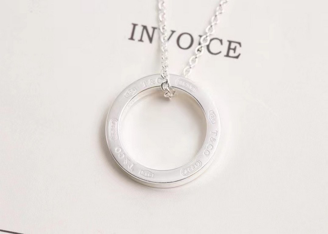 Tiffany 1837 Size Circle NecklaceThe Tiffany 1837 collection, engraved with the year of Tiffany's founding, is beautifully interpreted with smooth curves and contours. Simple and classic, this pendant is beyond glamorous