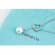 Tiffany Tiffany 2021 Heart Pearl Lasso Collar Chain Necklace from the Elsa Peretti Collection Open Heart is a simple, resonant design that illustrates the true meaning of love. The simplicity of the pearls emphasizes the