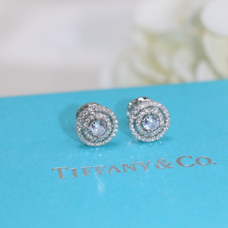 Tiffany Tiffany Stud Earrings Diamond studs in S925 sterling silver with saucer ear buds plated in white gold  .