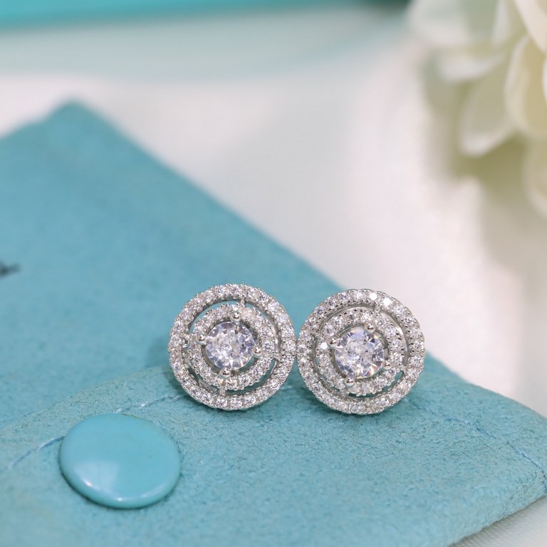 Tiffany Tiffany Stud Earrings Diamond studs in S925 sterling silver with saucer ear buds plated in white gold  .