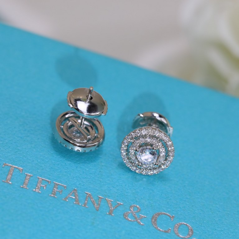 Tiffany Tiffany Stud Earrings Diamond studs in S925 sterling silver with saucer ear buds plated in white gold  .