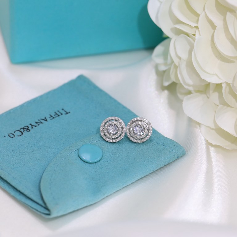 Tiffany Tiffany Stud Earrings Diamond studs in S925 sterling silver with saucer ear buds plated in white gold  .