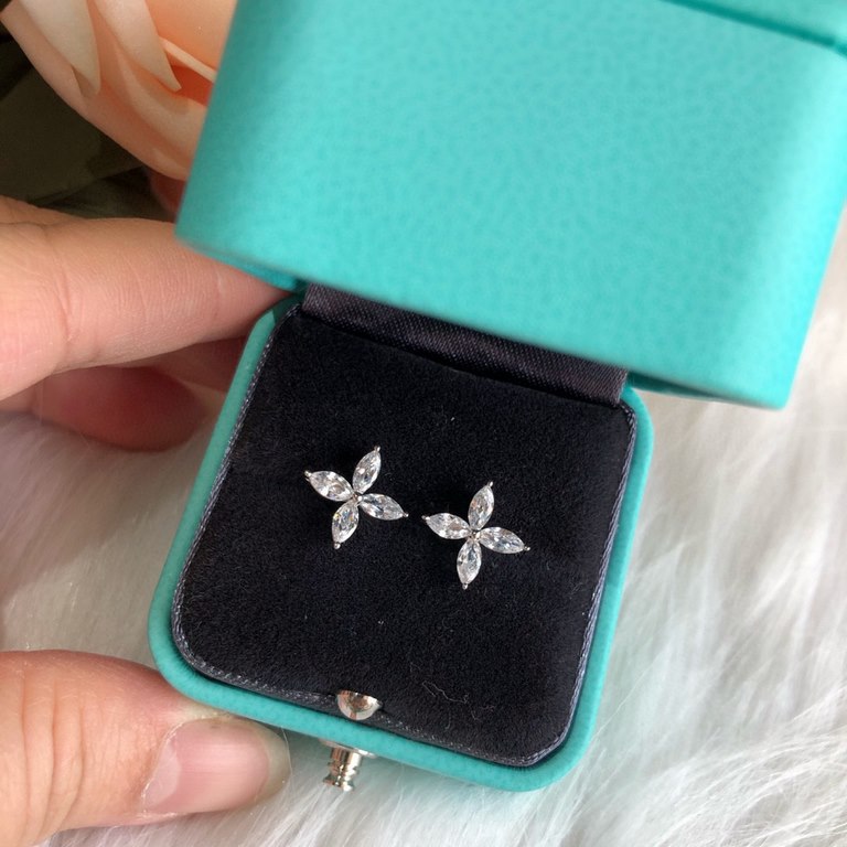 9 2  5  Tiffany Delicate Horse's Eye Stud Earrings Tiffany Fleur de Lis collection's design is gentle and soft, highlighting the delicate elegance and understated bloom confidence Very delicate and eye-catching. Original