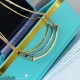 V gold material Tiff    counter Latest Double T  Smile  Tiffany medium light gold smiley necklace  11 heavy work tiffany with a smiley face the strongest inspiration for the design, the smile is one of the most beautiful