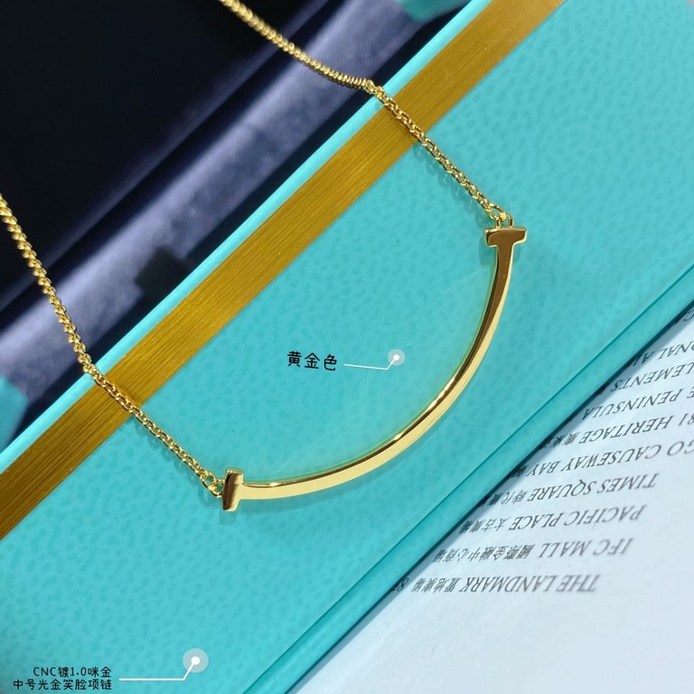 V gold material Tiff    counter Latest Double T  Smile  Tiffany medium light gold smiley necklace  11 heavy work tiffany with a smiley face the strongest inspiration for the design, the smile is one of the most beautiful