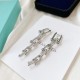 Tiffany Tiffany HardWear Collection Chain  Long Stud Earrings Elegance and subversive spirit go hand in hand, sensitively capturing the essence and energy of the stylish woman strolling through New York. Tensioned and st