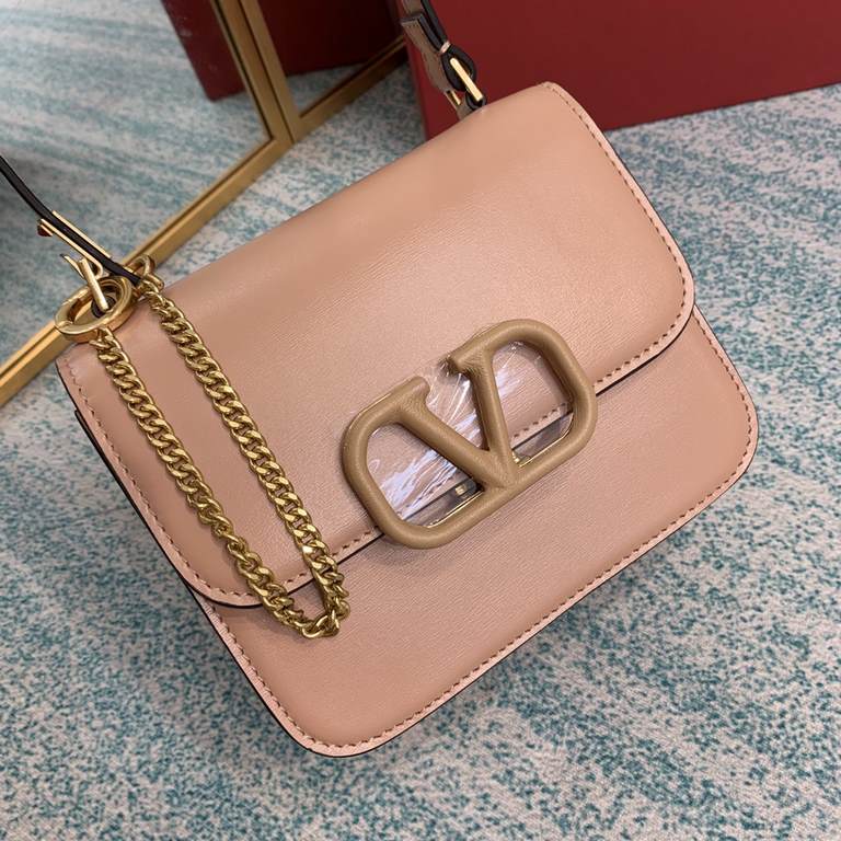 Small   model BOXValentino Garavani VSLING Shiny calf leather shoulder bag   with extendable shoulder strap for shoulder and crossbody use. Vintage brass-finished metal hardware Magnetic closure with leather-covered logo