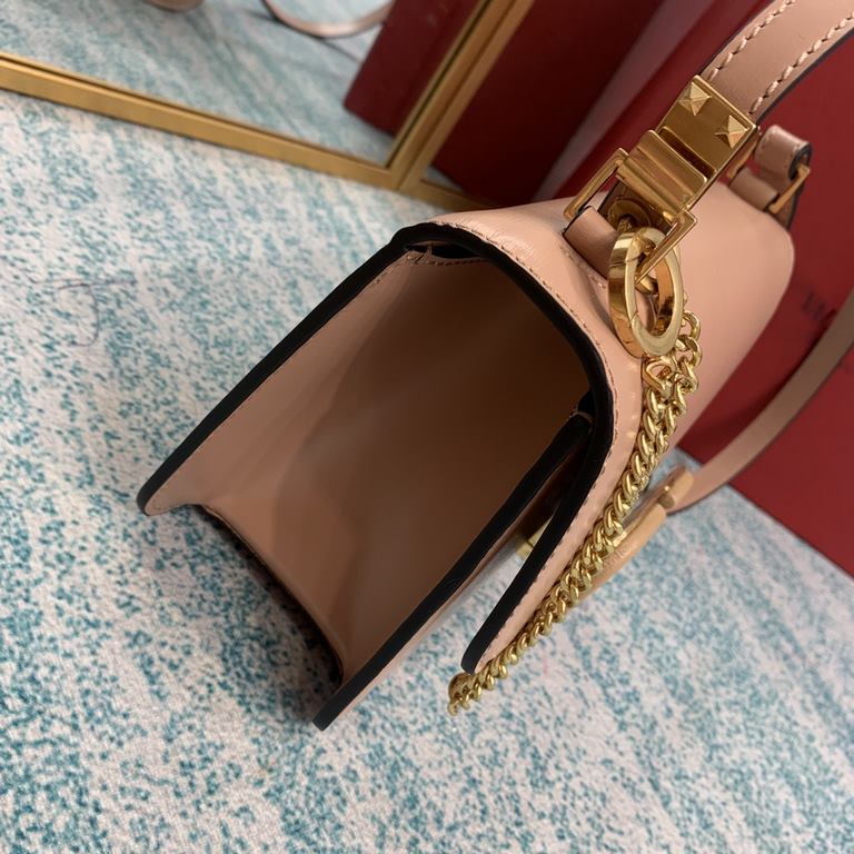 Small   model BOXValentino Garavani VSLING Shiny calf leather shoulder bag   with extendable shoulder strap for shoulder and crossbody use. Vintage brass-finished metal hardware Magnetic closure with leather-covered logo