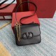 Small black buckle   model BOXValentino Garavani VSLING Shiny calf leather shoulder bag   with extendable shoulder strap for shoulder and crossbody use. Vintage brass-finished metal hardware Magnetic closure with leather