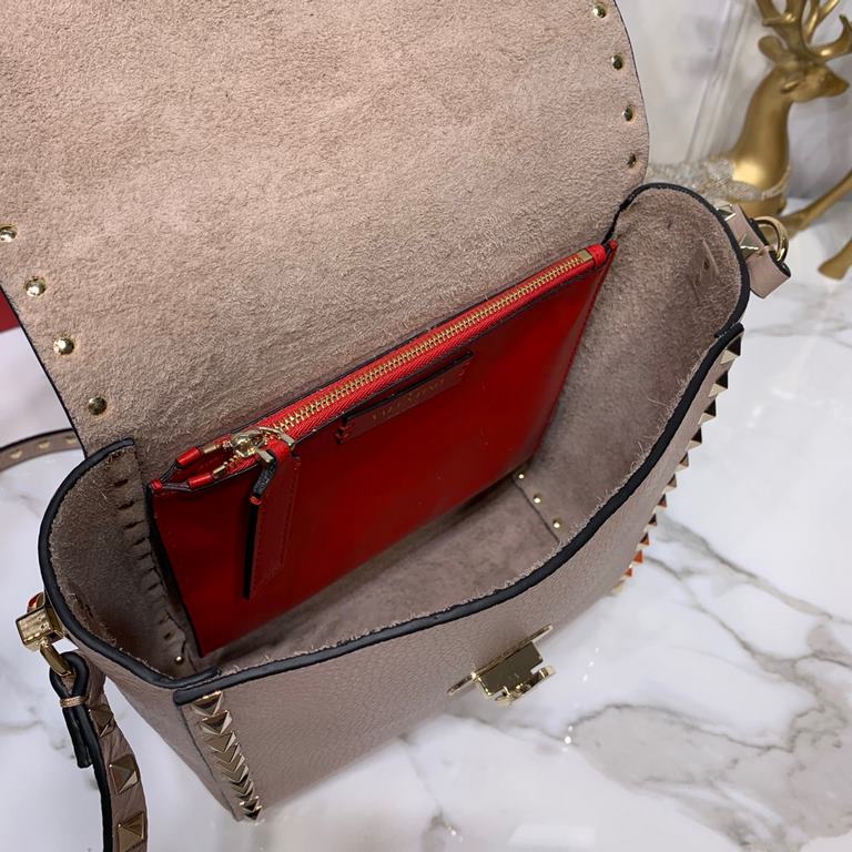 Grained vertical Valentino Valentino calfskin crossbody bag embellished with metallic moose print Matching color-finished studs and metal hardware - Hook-and-loop closure Adjustable shoulder strap 0182#- Cotton lining. I