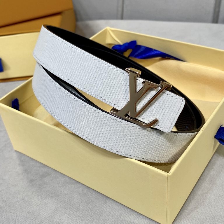 Comes in a fully packaged gift box  .               The newest   belt. Width 25mm Reversible calfskin leather embossed striped black on white Reversible with refined faux jade buckle